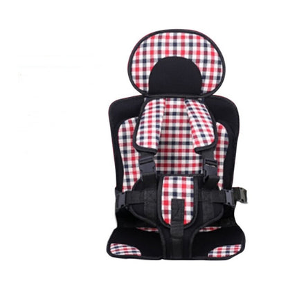 Children's car seat with red and black checkered pattern on a white background