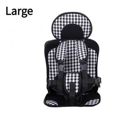 Black and white checkered child car seat on a white background