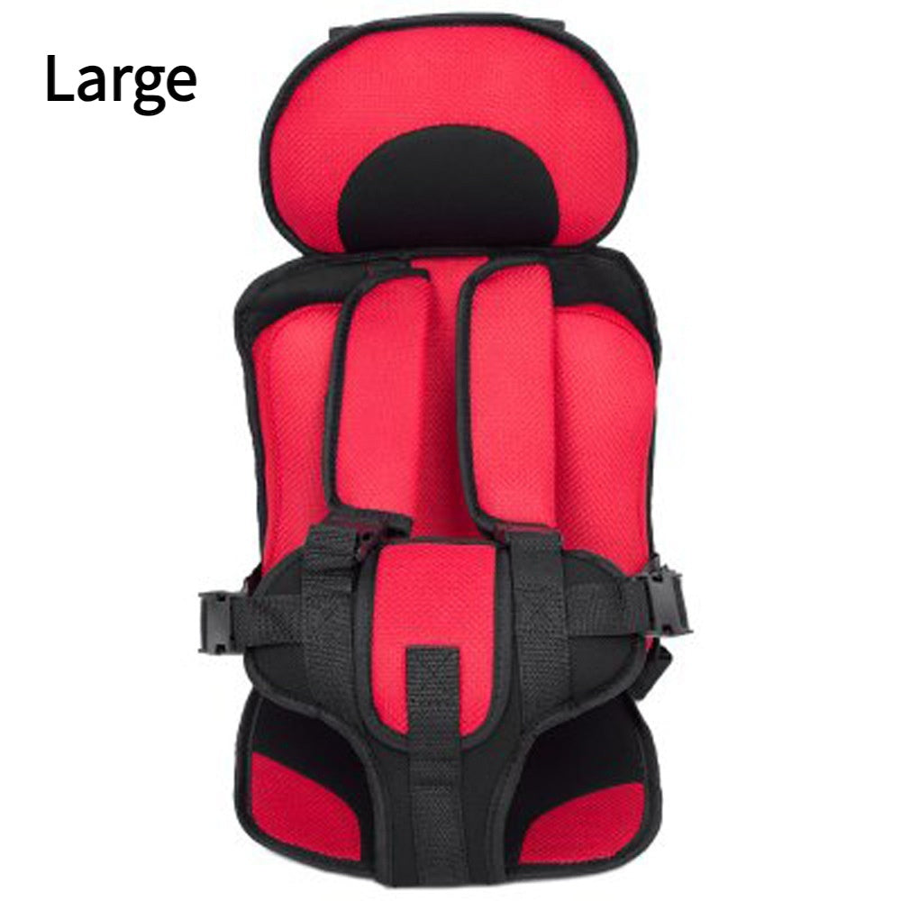 Red and black child car seat on a white background