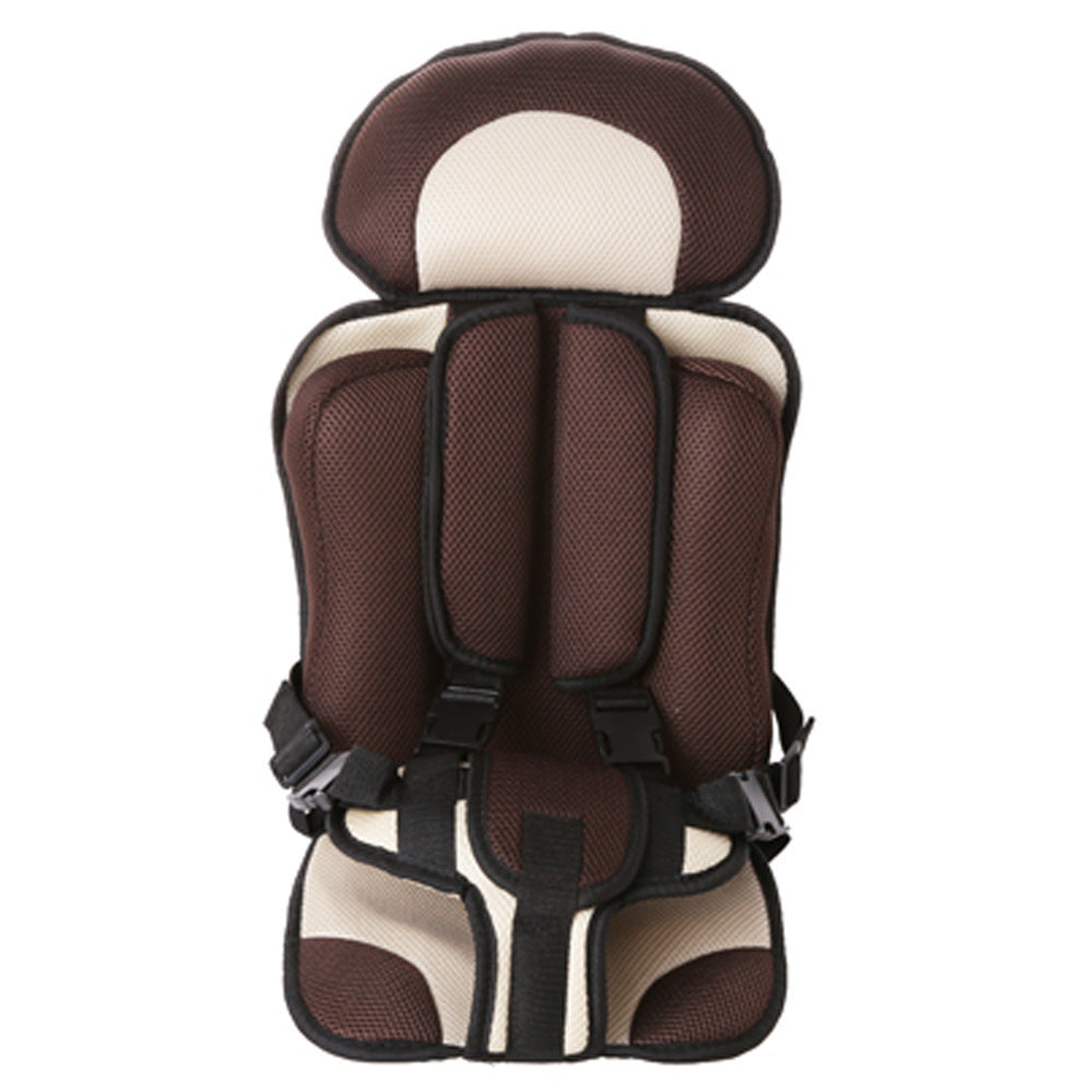 Brown and beige child car seat on a white background