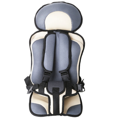 Child safety seat with gray and beige design on a white background