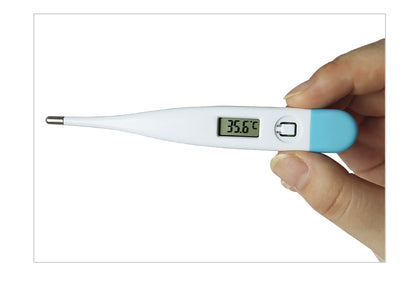 Digital thermometer held by a hand with a white background